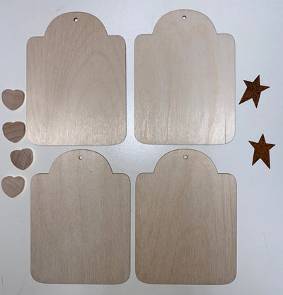 Set of four ornament with metal stars and wooden hearts